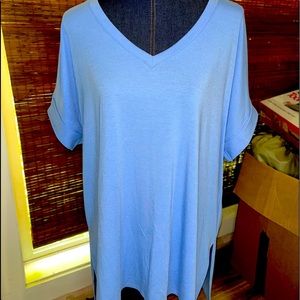 Woman’s blue top
